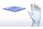 surgeon donning a glove
